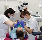 Лечение зуба микроскопом цена